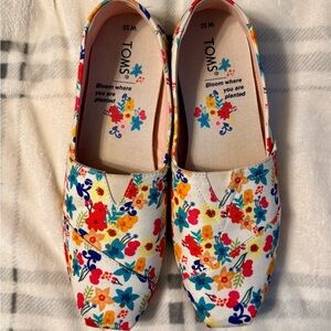 TOMS White Floral Canvas Slip-Ons with Red, Yellow & Teal Flowers